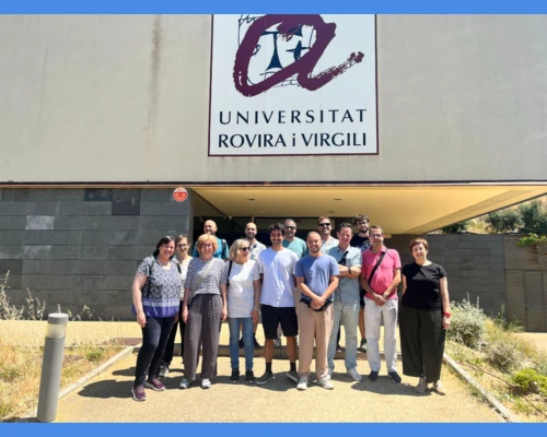 the participants in the visit in a group photo
